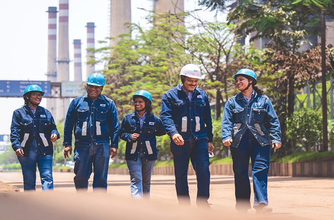 JSW Steel employees walking at the plant