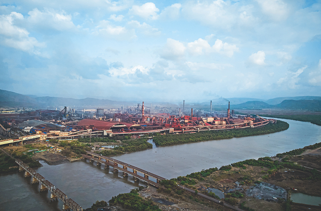 Aerial view of JSW Steel plant by the river